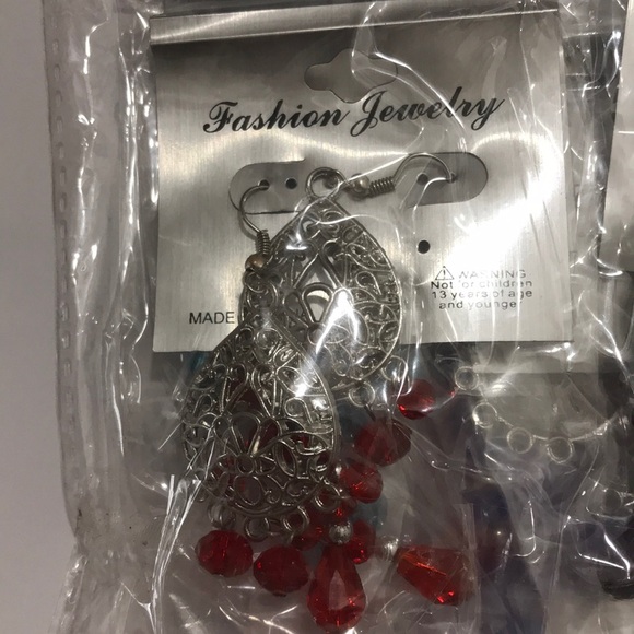 Wholesale Jewelry - 12 NIP Crystal/Silver Dangling Earrings 3”